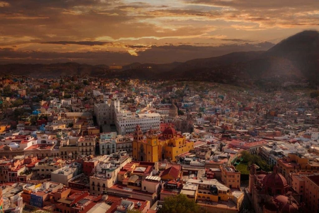 AERIAL VIEW OF GUANAJUATO CITY AT SUNSET WITH THE CHURCH IN THE MIDDLE