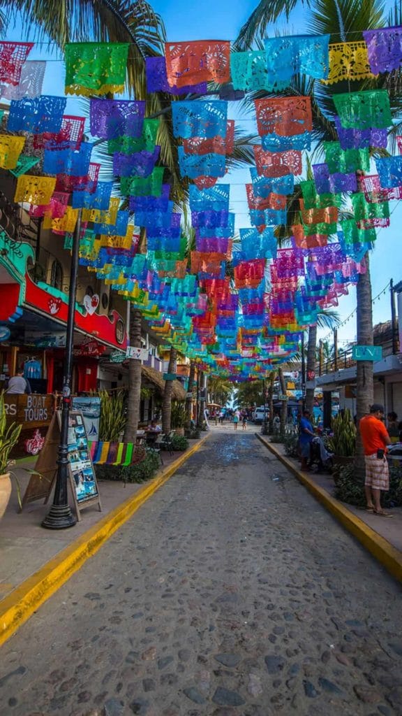 Sayulita twn centr with paper flags hang across the street