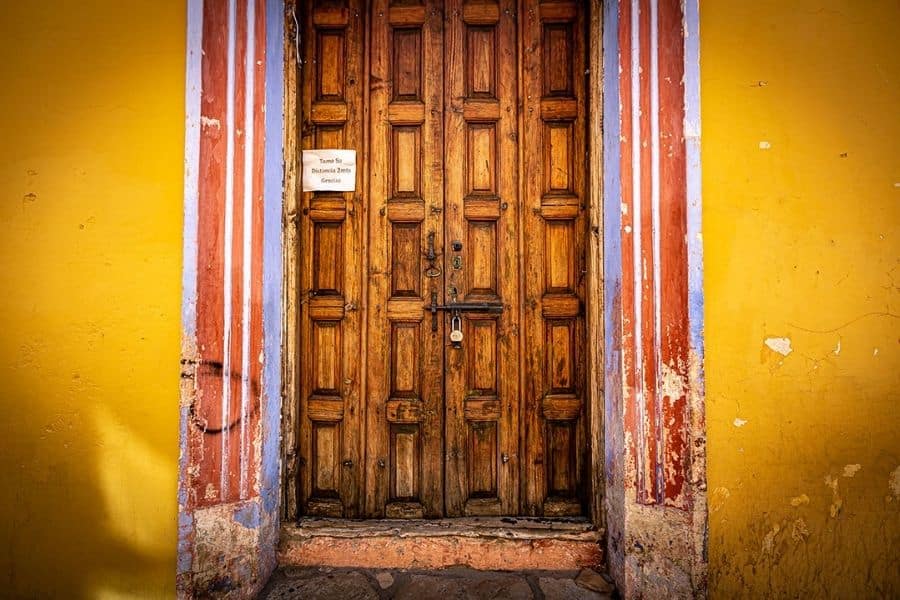Old door and orange wall 