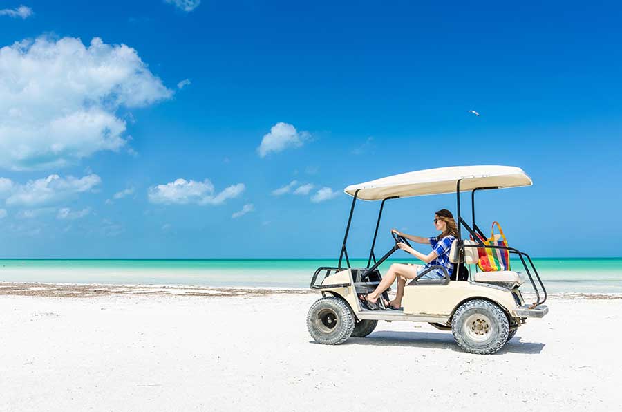 isla mujeres golf cart on the beach 