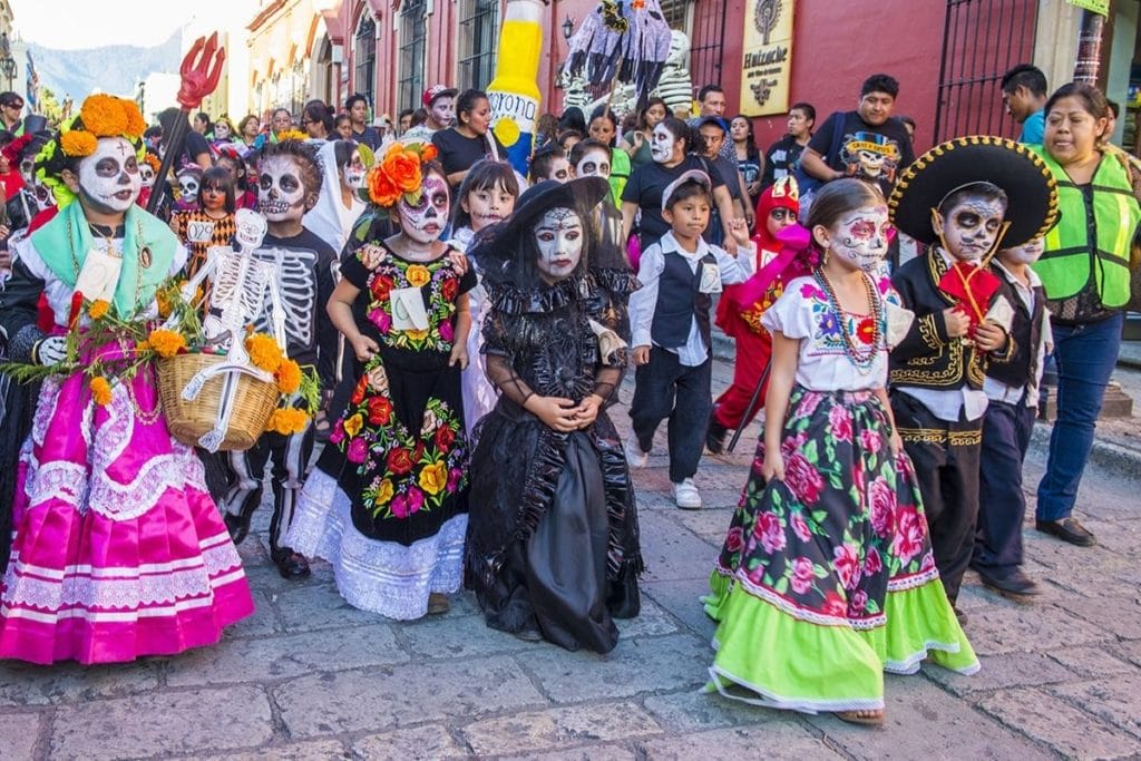 Girls in traditional clothes during the day of the dead 