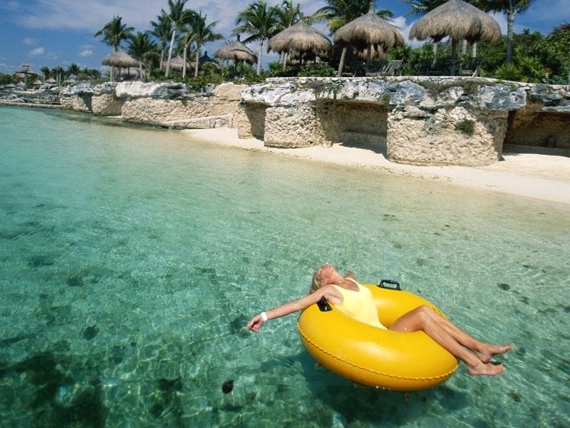 woman on a floating device in the water in Mexico