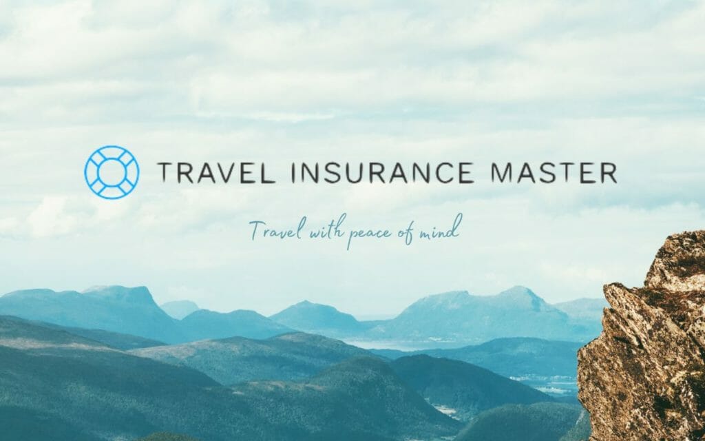 A serene mountain landscape with "Travel Insurance Master" text overlay, including a lifebuoy icon and the slogan "Travel with peace of mind."