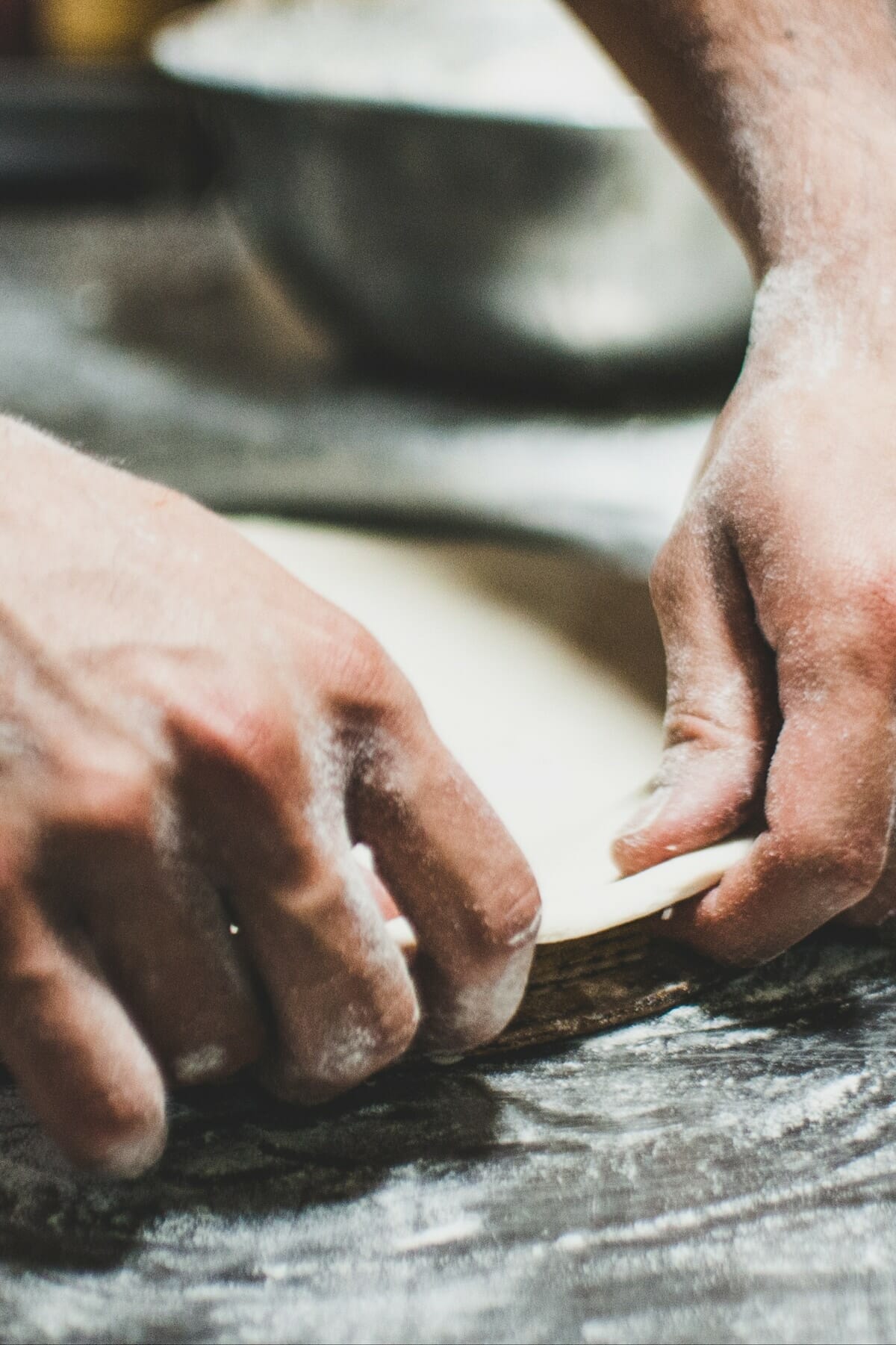 hands making tacos
