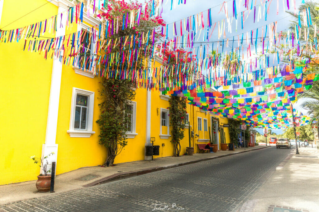 Colorful party flags hanging above the street of San Jose del Cabo