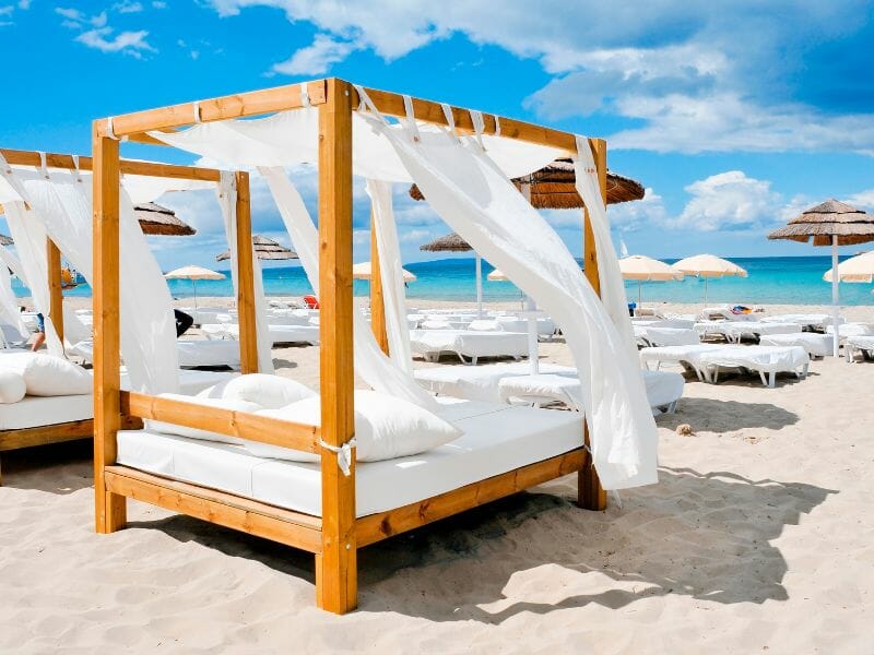 Elegant beach lounge - one of the awesome experiences in one of the best beach clubs in Cabo you don't want to miss.