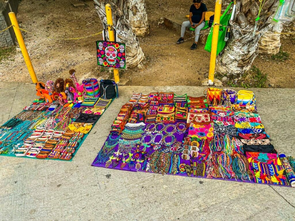 View of souvenirs displayed on the street.