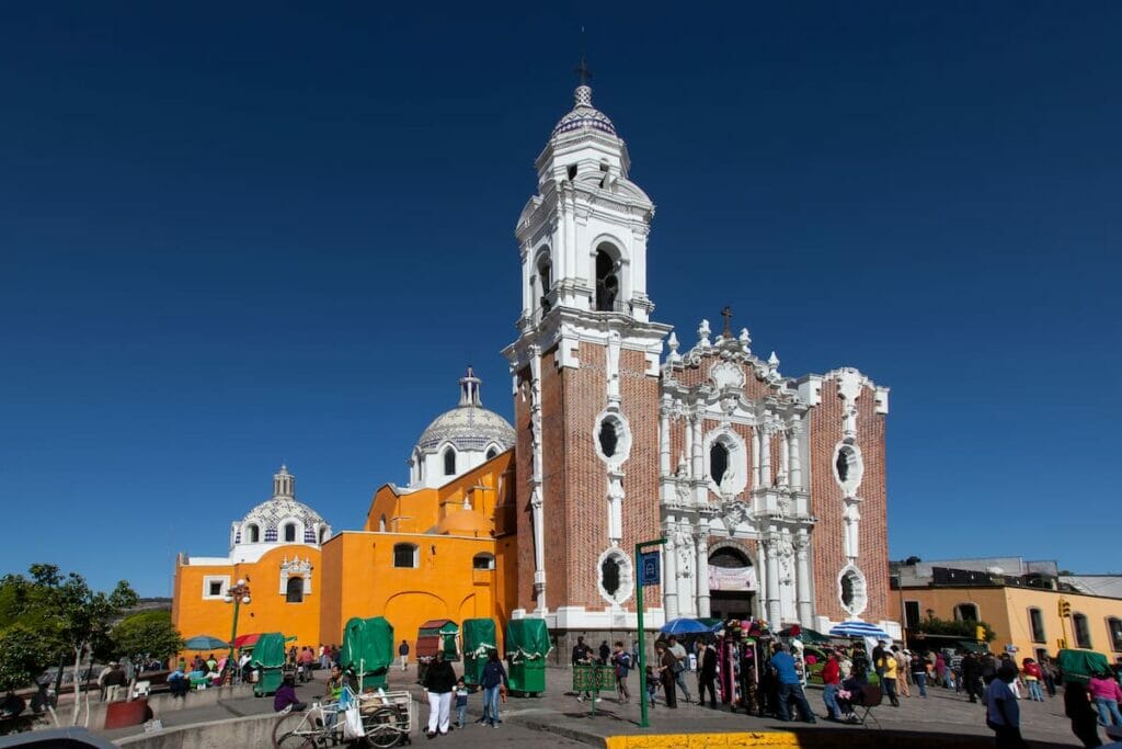 View of a church in Tlaxcala under a blue sky.