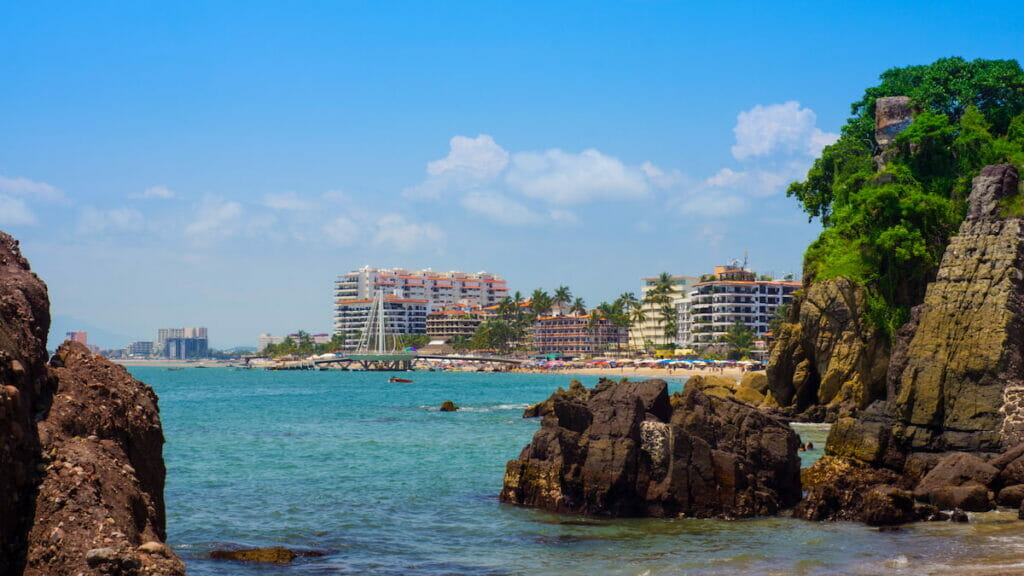 Beach with rock mountains in Puerto Vallarta.