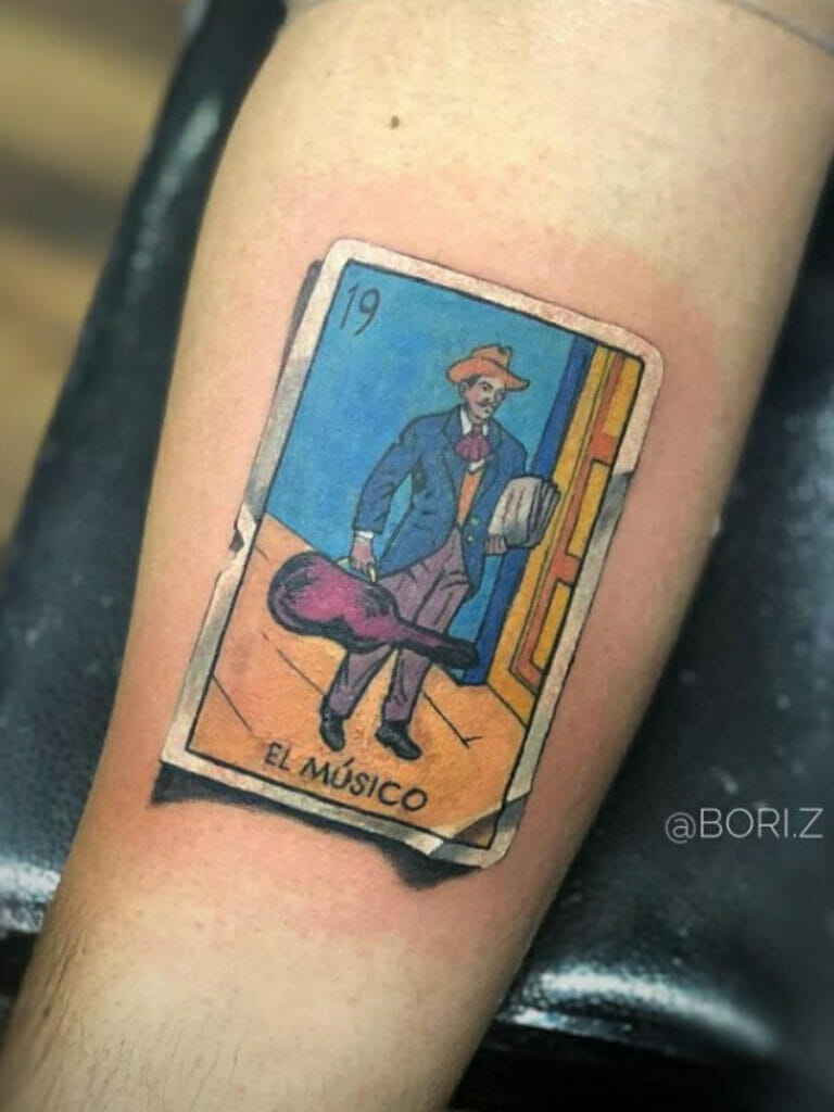 La Loteria Mexican tattoo with an image of a card with skeletal person