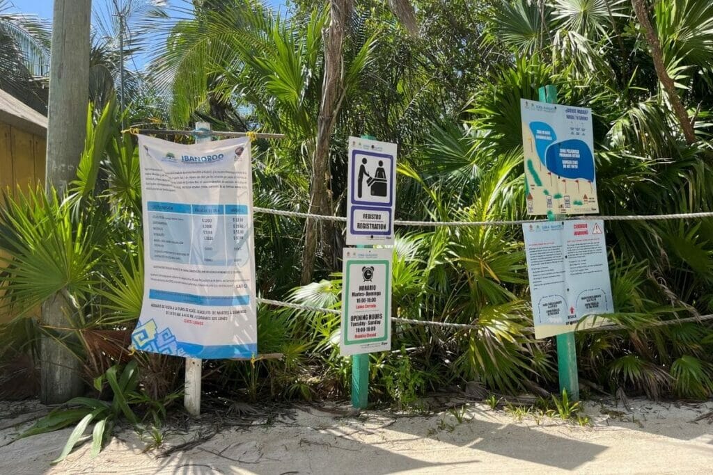The price signage on the entrance of Xcacel Beach.