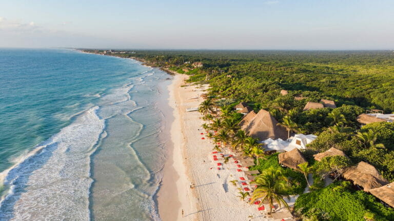 The aerial view of Tulum under a clear sky.