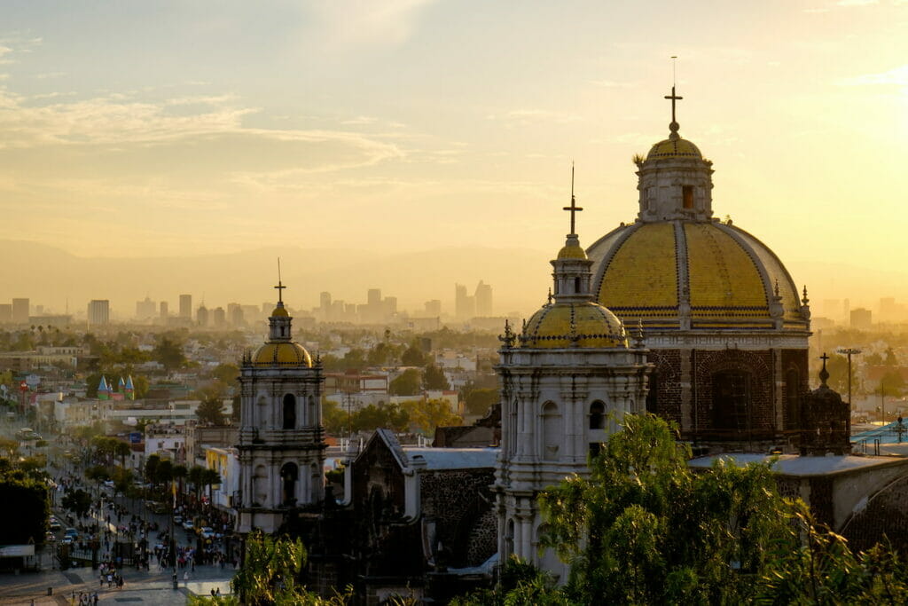 Aerial view of the Basilica of Guadalupe at sunset.