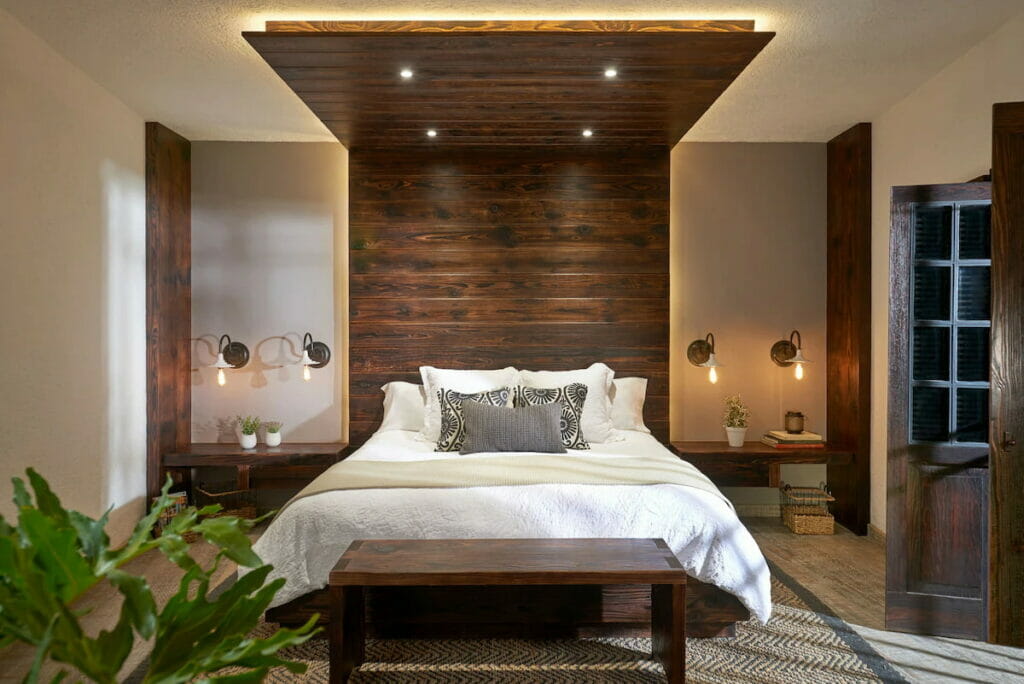 A hotel room with wood accents.