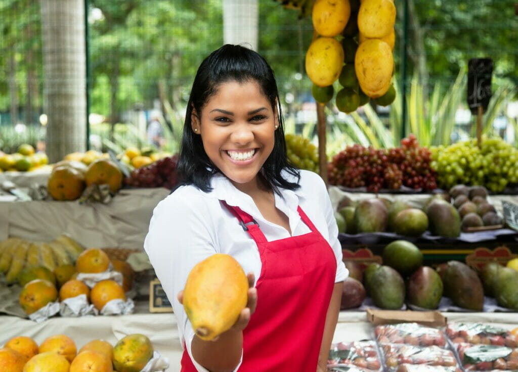 A woman selling fruits in Mexico.