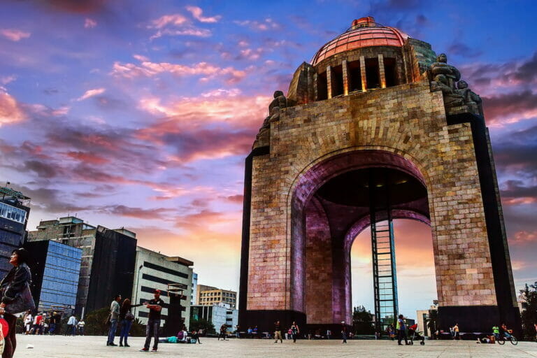 Monumento a la Revolucion as the sun sets - one of the famous attractions in Mexico city - when is the best time to visit in Mexico City?