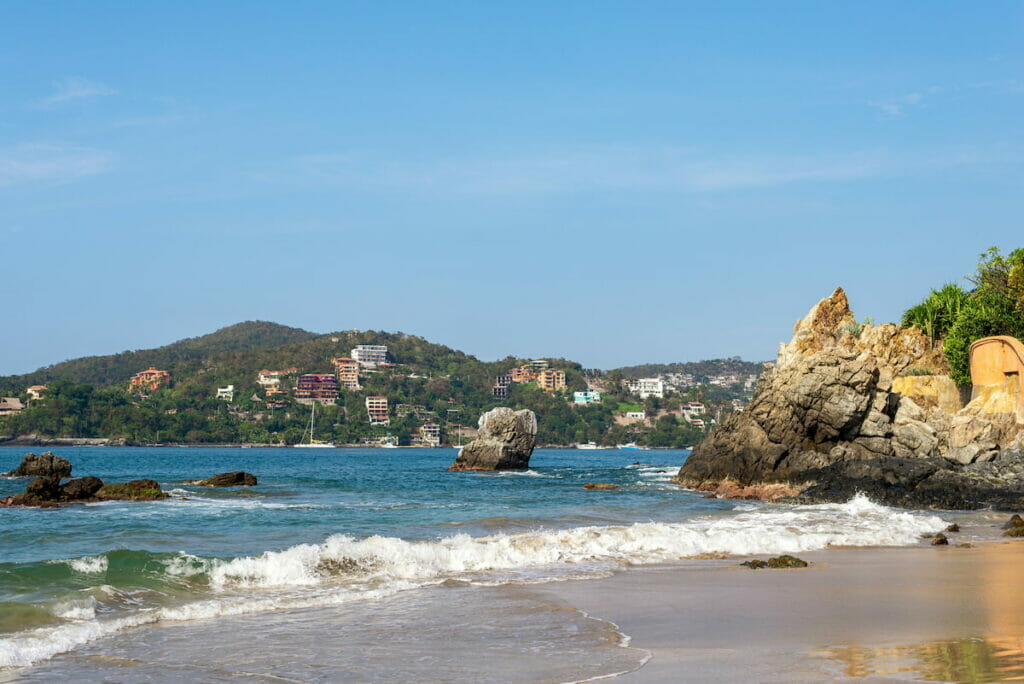 Playa La Ropa under a clear sky.