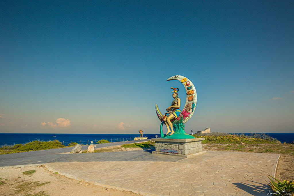 The Moon Statue in Isla Mujeres on a clear sky.