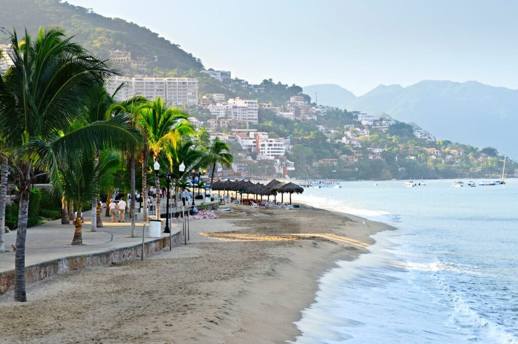 A beach in Puerto Vallarta with tourists.
