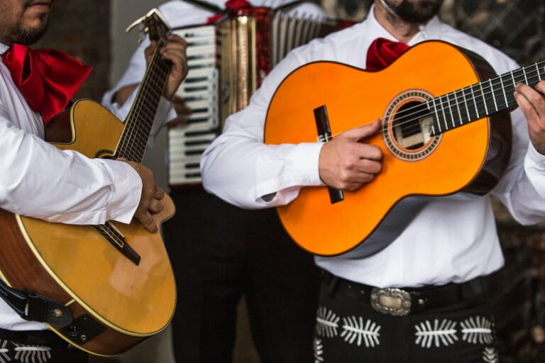 Mariachi using acoustic guitars.
