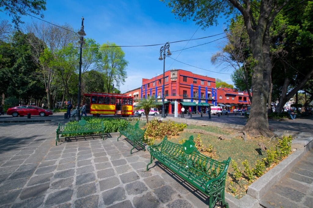 Parque Centenario in Coyoacan surrounded by traditional houses.