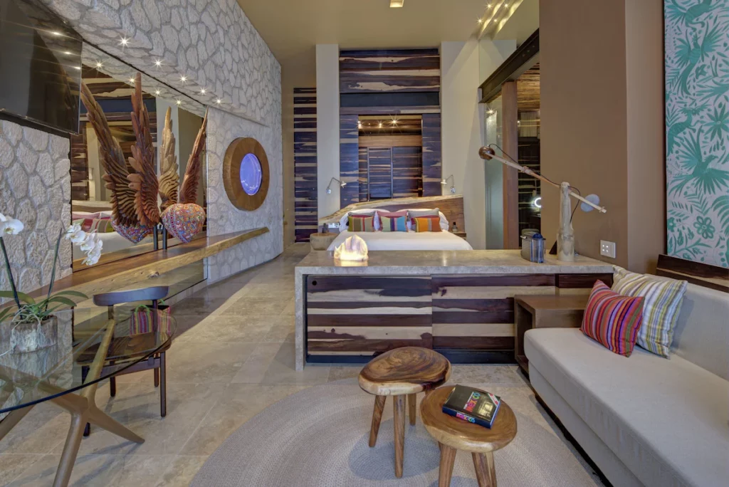 La Casa De La Playa by Xcaret room with colorful furniture and accents.