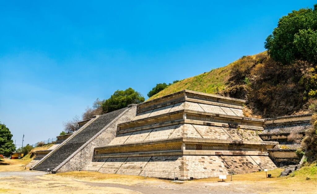 Pyramid of Cholula under a clear bllue sky.
