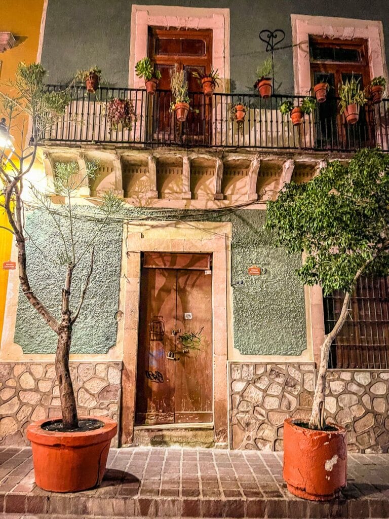 Guanajuato House facade with trees beside the door