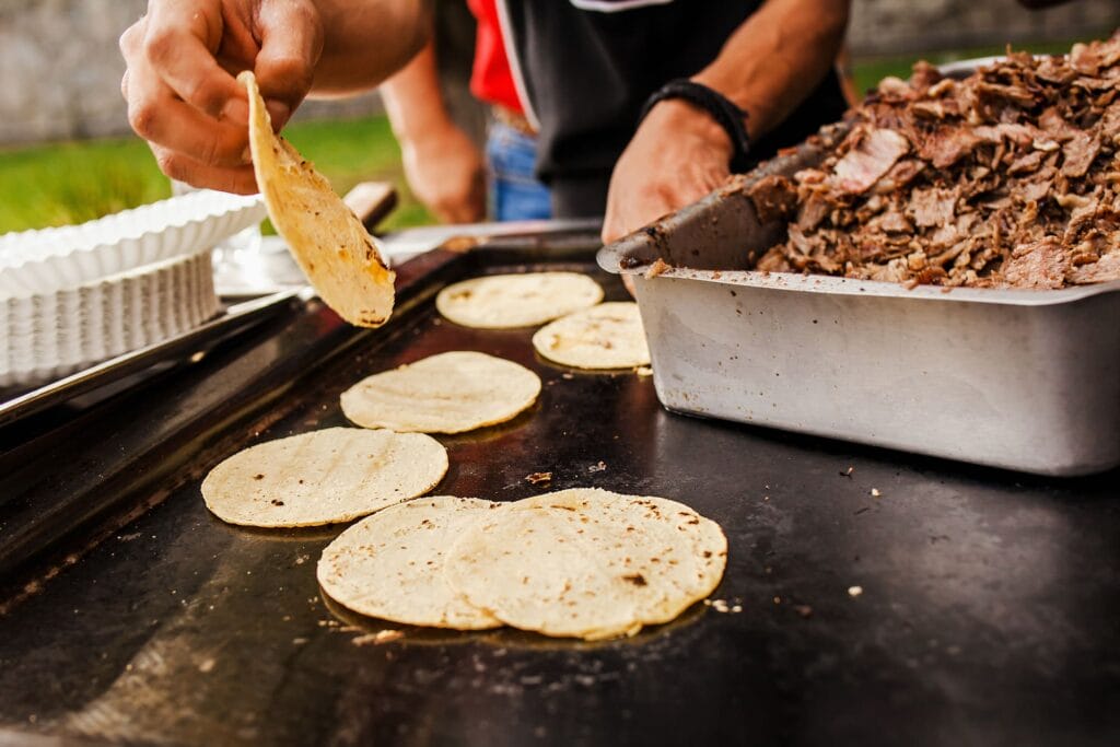 Preparing tacos.