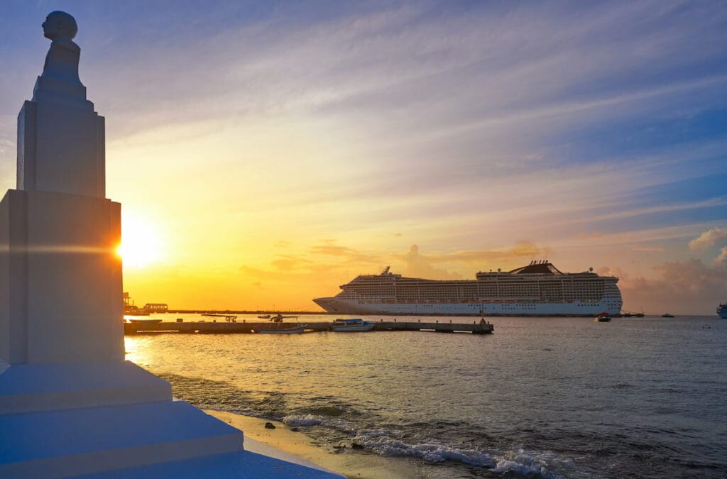 A ferry on a sunset near the docks of Cozumel.