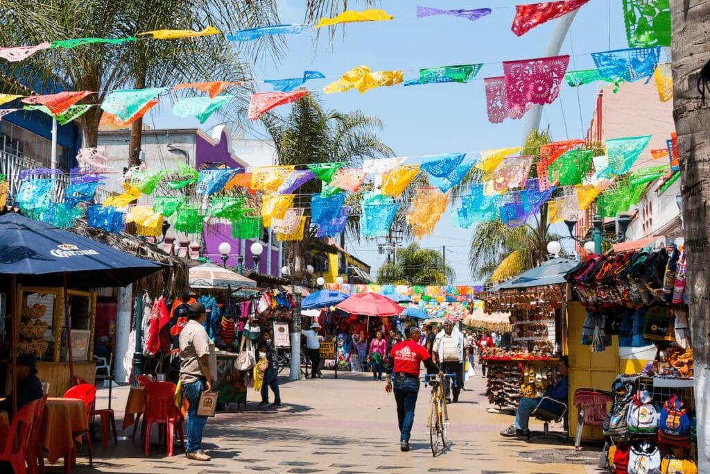 Cecilia street with colorful banderitas.