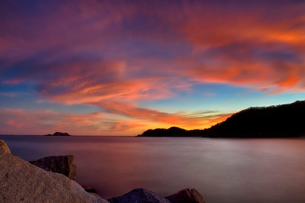 Beach in Escondido under a pink blue sky.