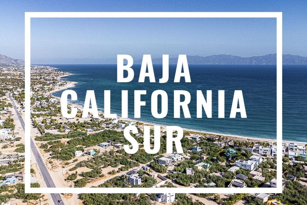 blue sea bay with a road on the left