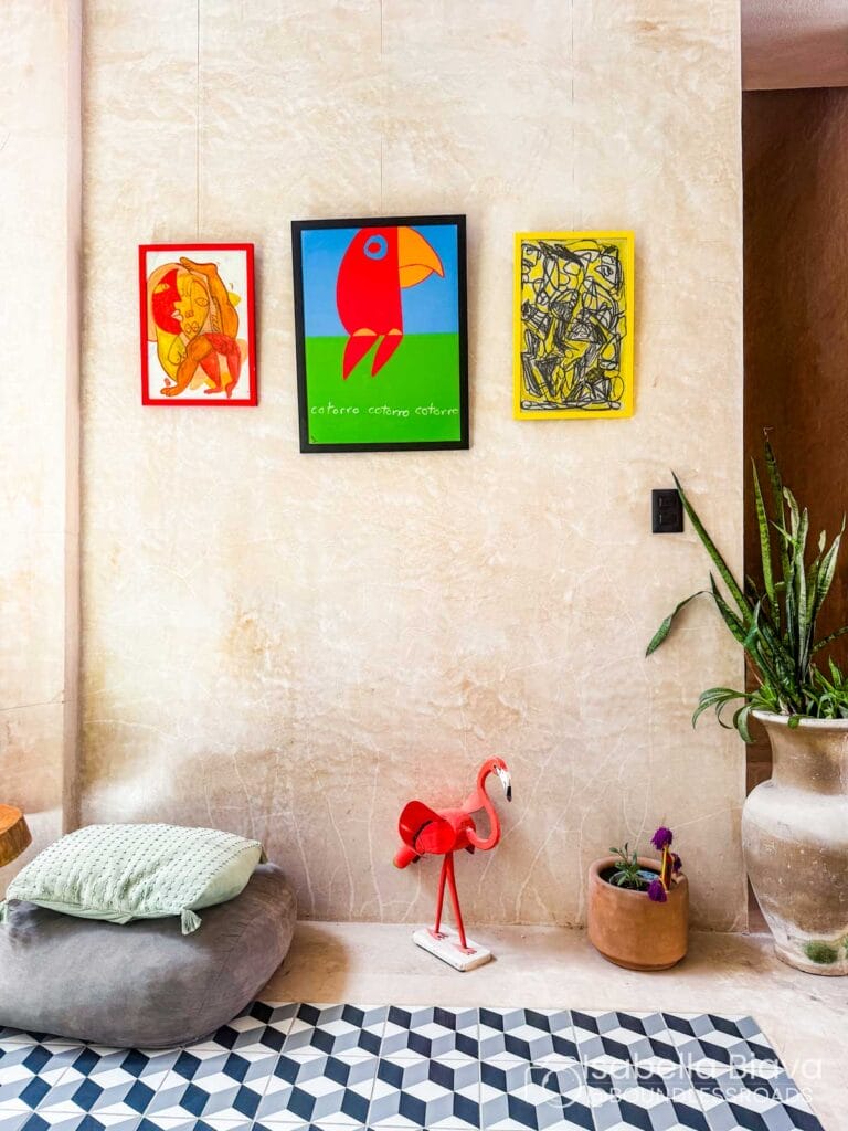 Colorful artwork and decor in stylish modern room.