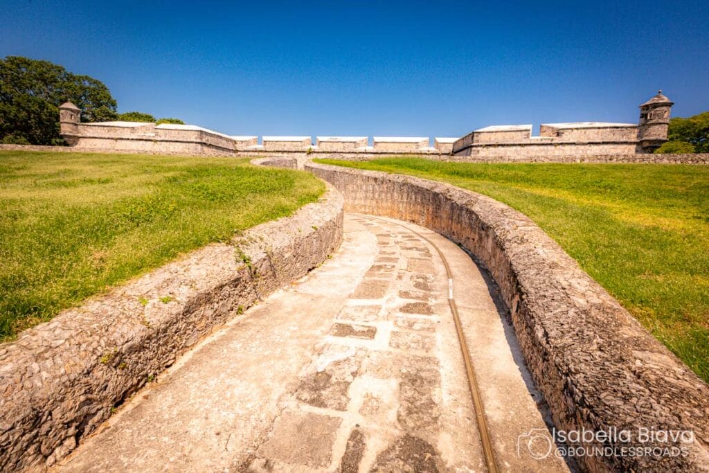 Historic stone fortress under clear blue sky